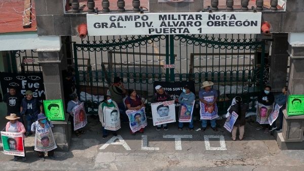 Parents of students protest in front of military headquarters in Mexico